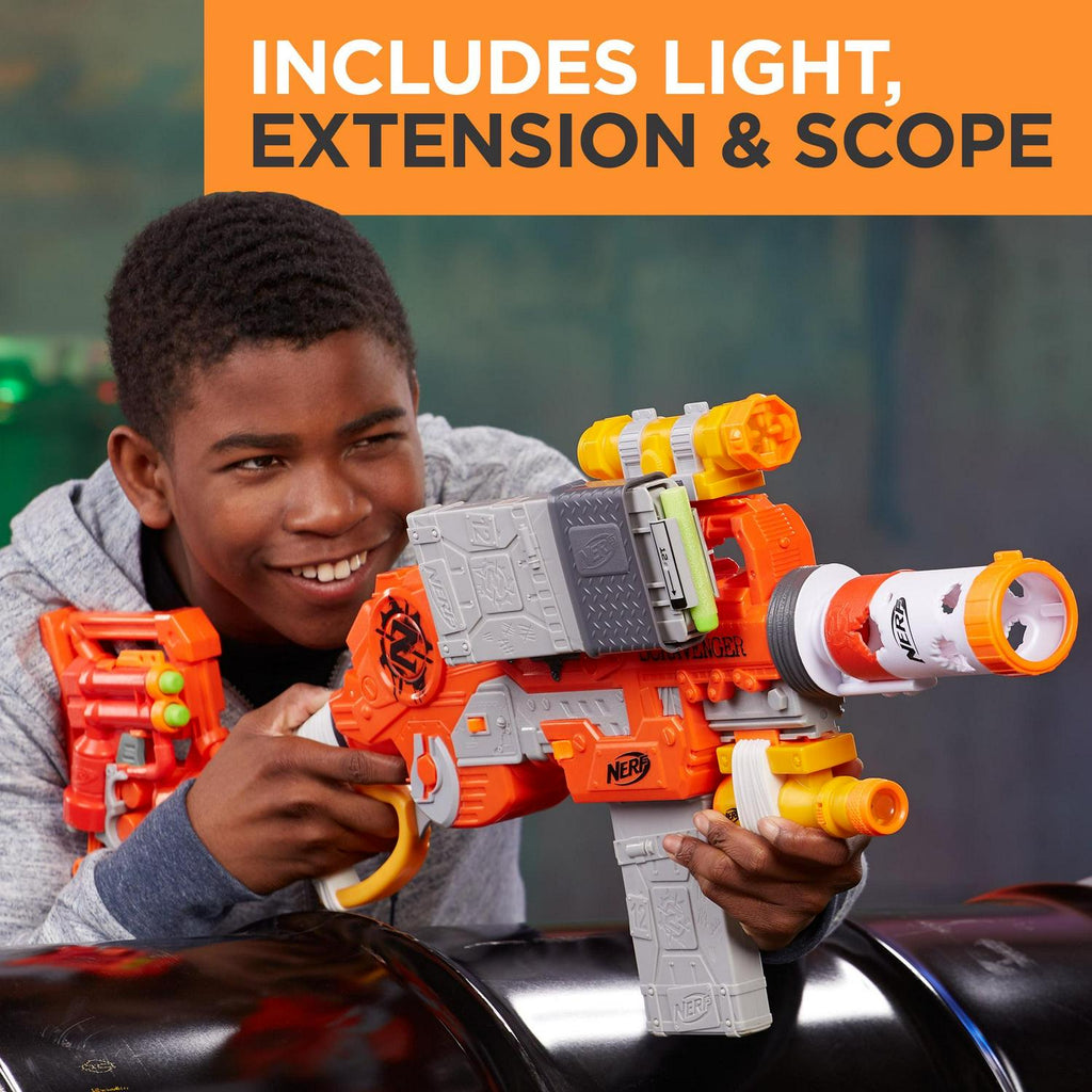 Nerf Zombie Strike Survival System Scravenger with Two 12-Dart Clips. 26 Darts. Light. Barrel Extension. Scope. Stock. and 2-Dart Blaster